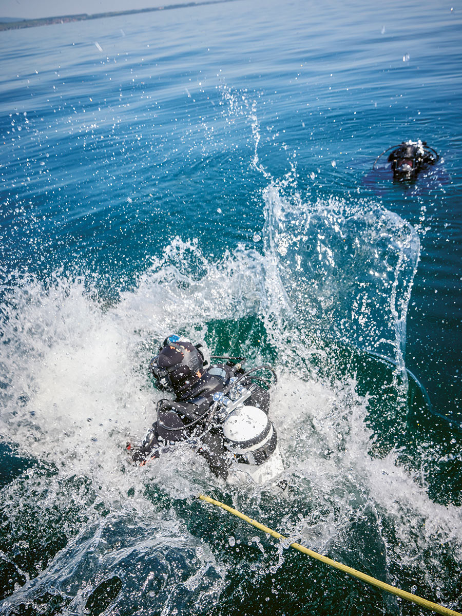 Two divers in Lake Constance, on a mission to explore quagga mussels beneath the surface.